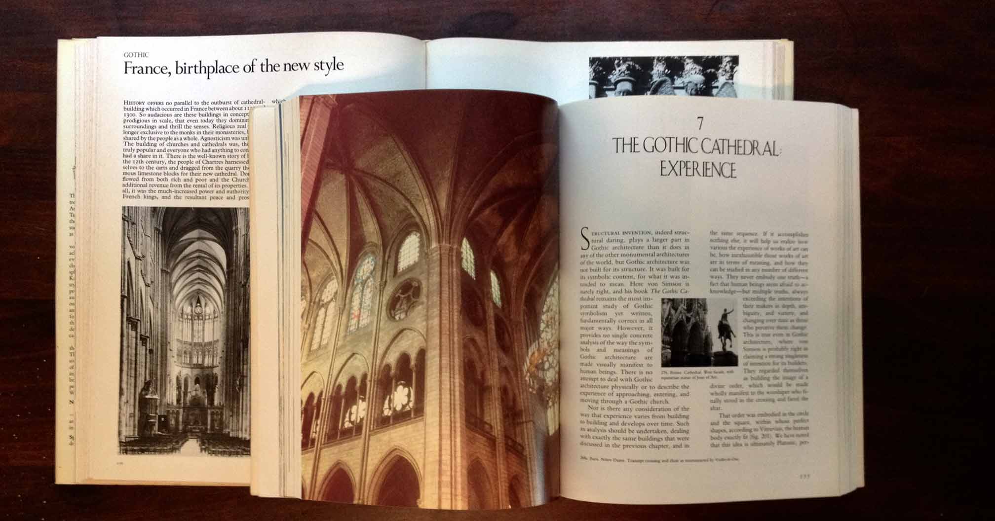 two architecture books open to articles on French Gothic cathedrals