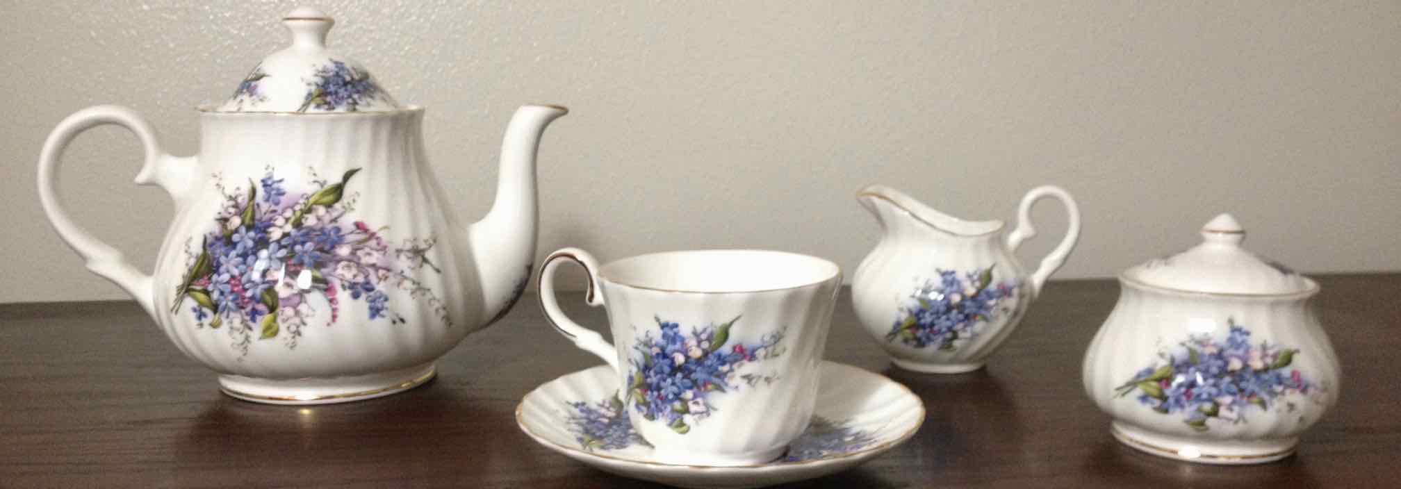 white china tea set with purple flowers